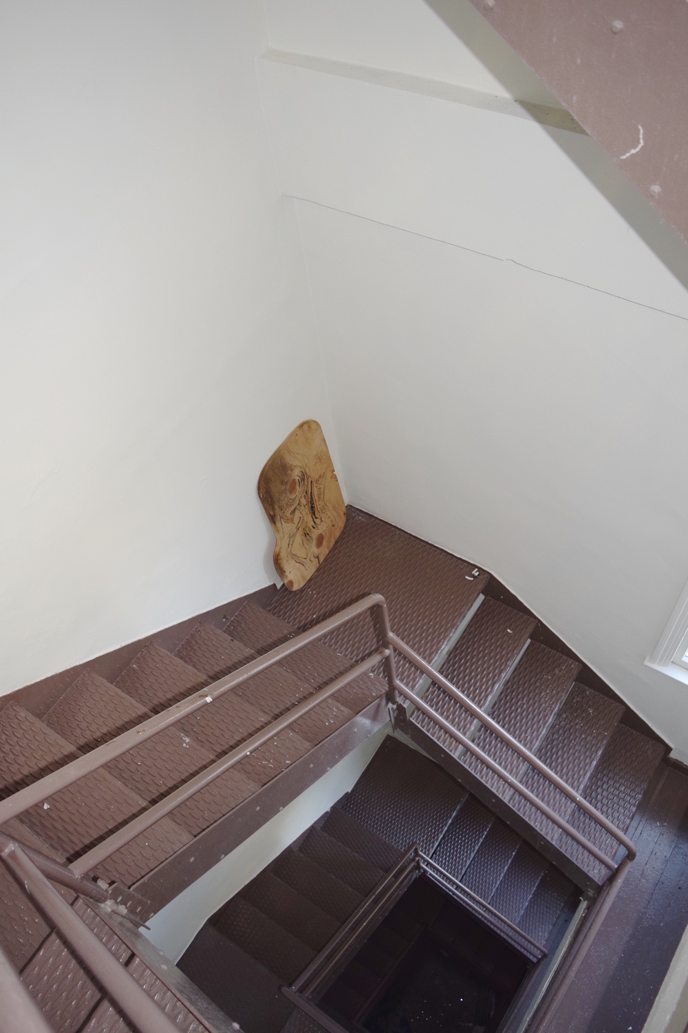 context shot of riff raff in stairwell
